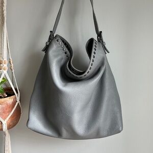 Grey Laggo bag with snap closure